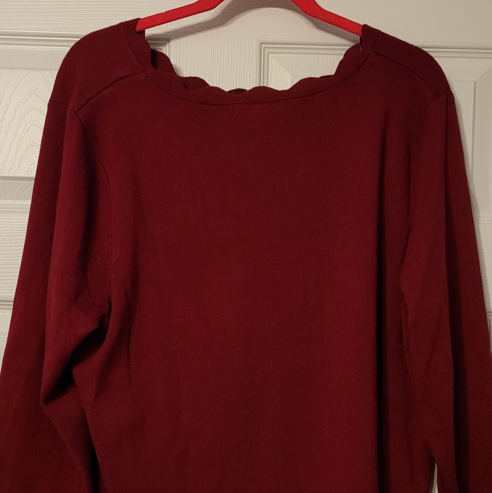 3/4 sleeve scoop,scalloped neckline sweater. The hem is also scalloped.